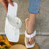 Women wearing flat bottomed sandals