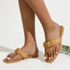 Women wearing flat bottomed sandals